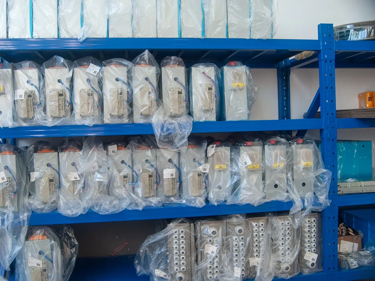Dumbwaiter vs material lift comparison shown on a warehouse racking system